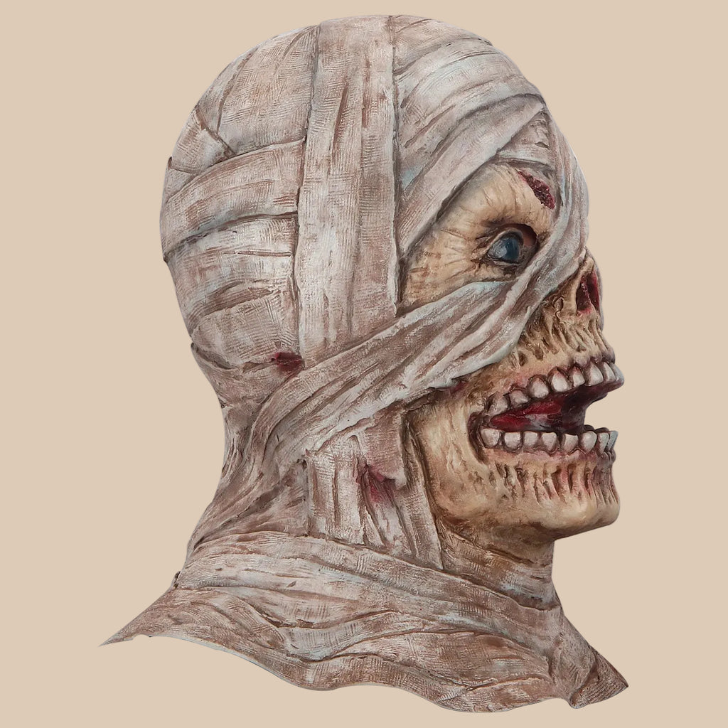 Mummy mask with wrapped bandage details and exposed teeth, side view