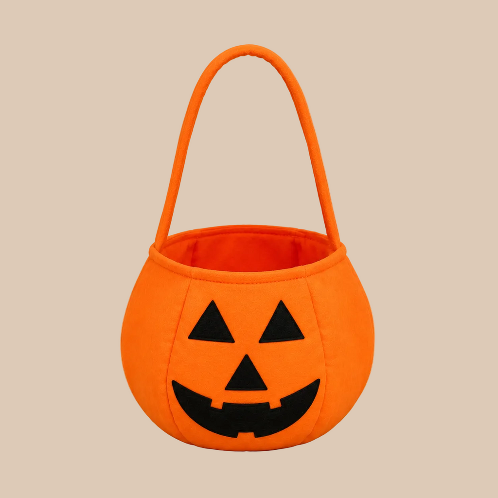 Orange pumpkin candy bucket with a handle, product view