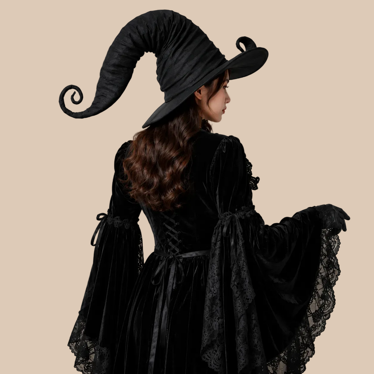 Black witch hat with a curled point, back view