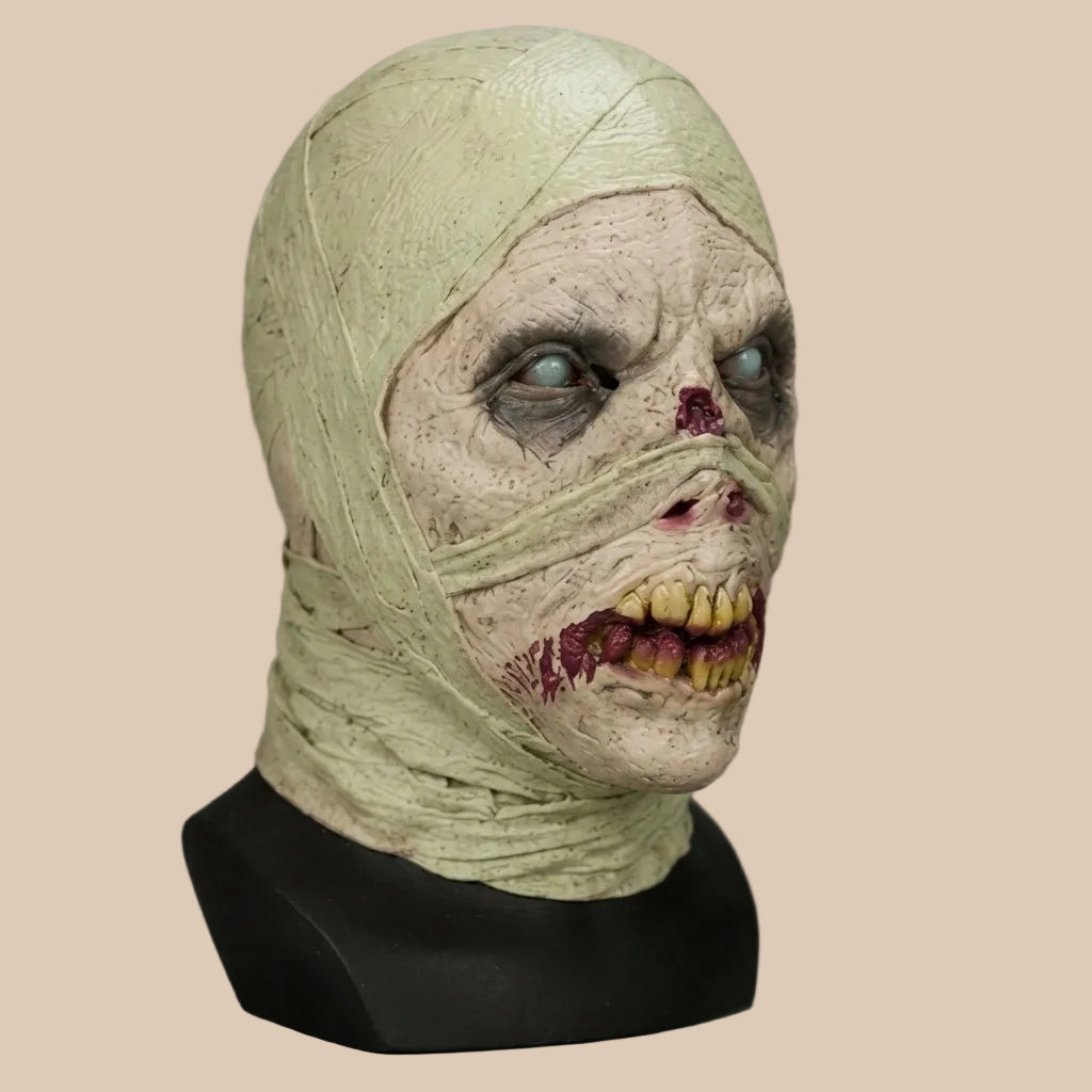 Mummy mask with bandaged face and long dark hair, product view