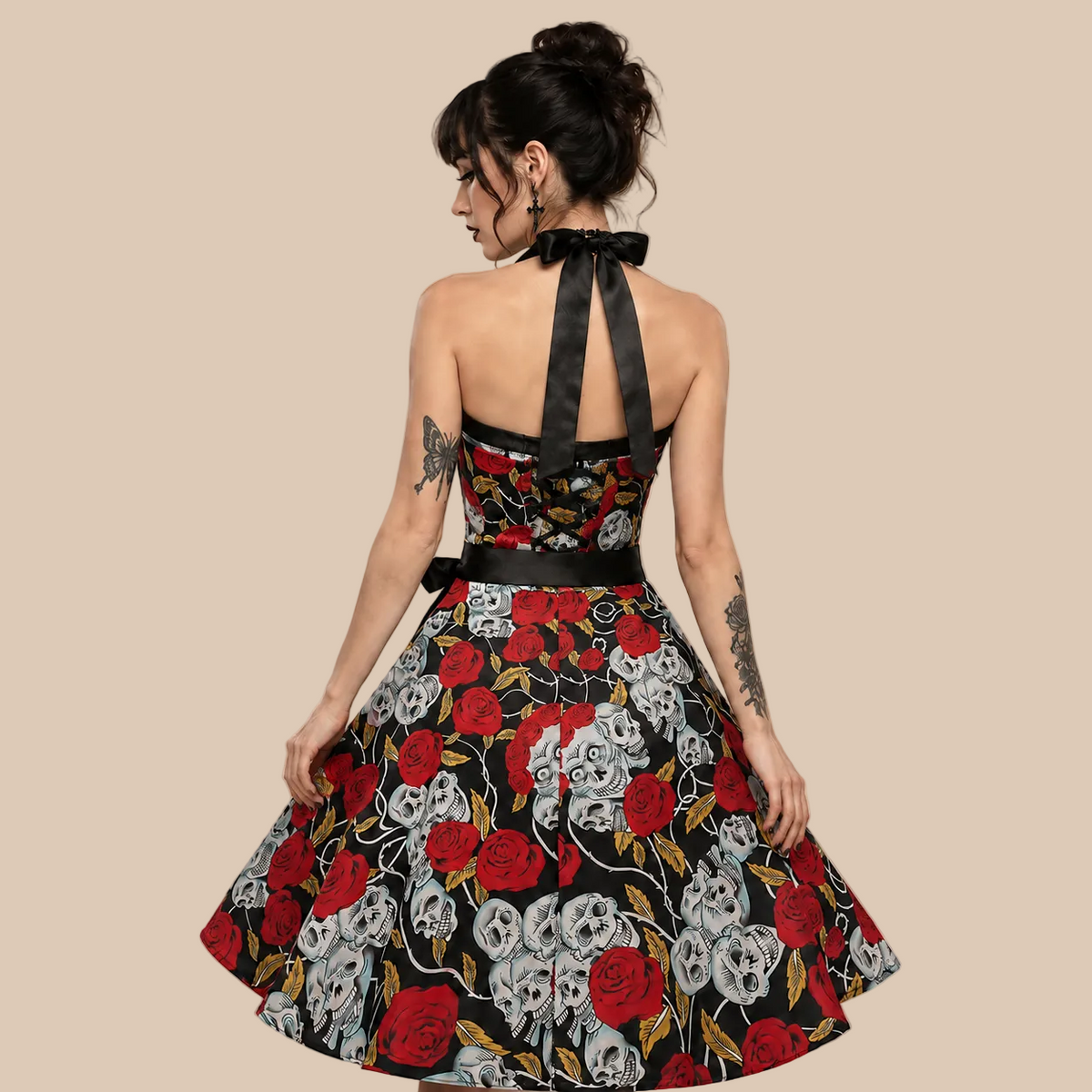 Halter-neck dress with red roses and skull motifs, back view