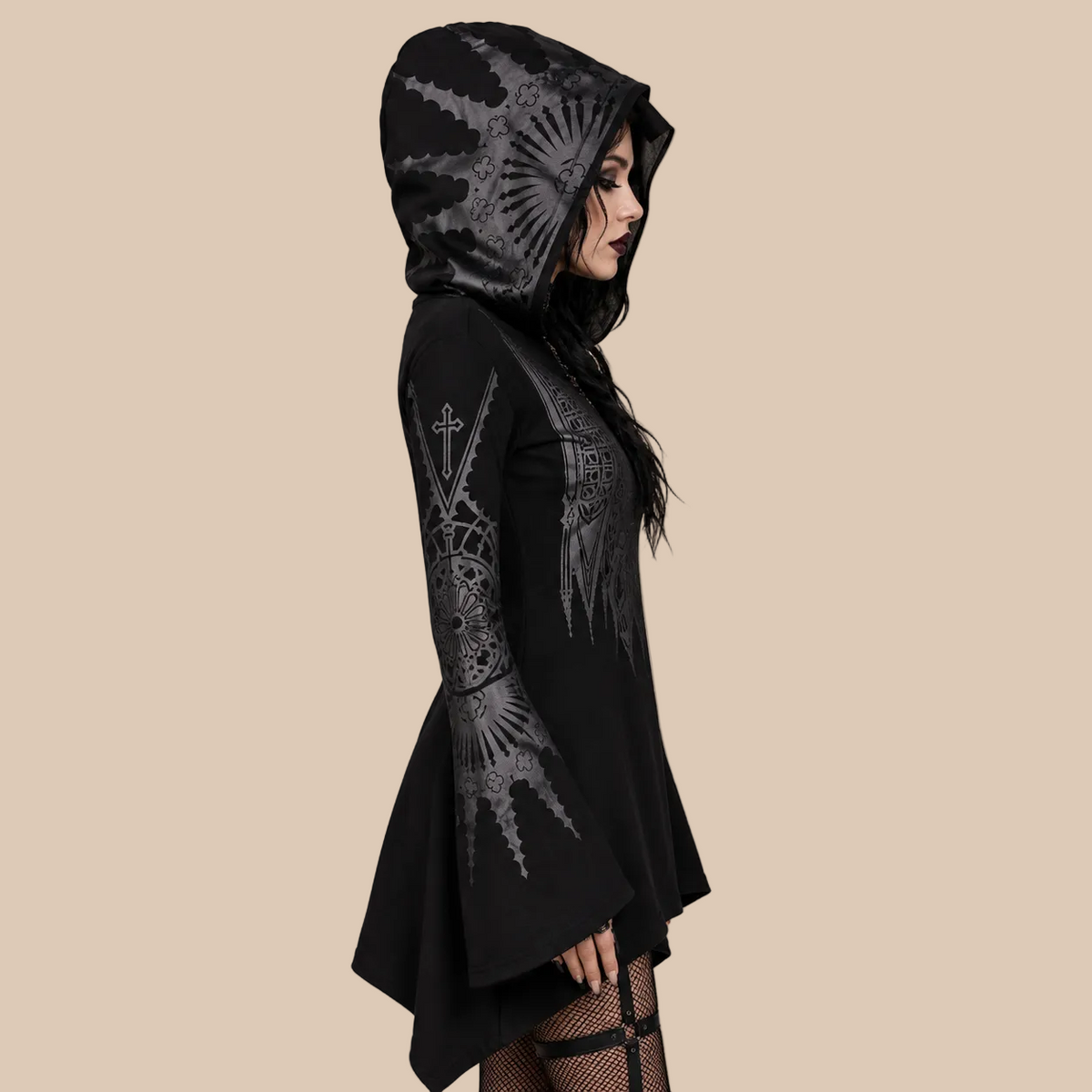 Women’s black printed hooded tunic with flared sleeves, side view