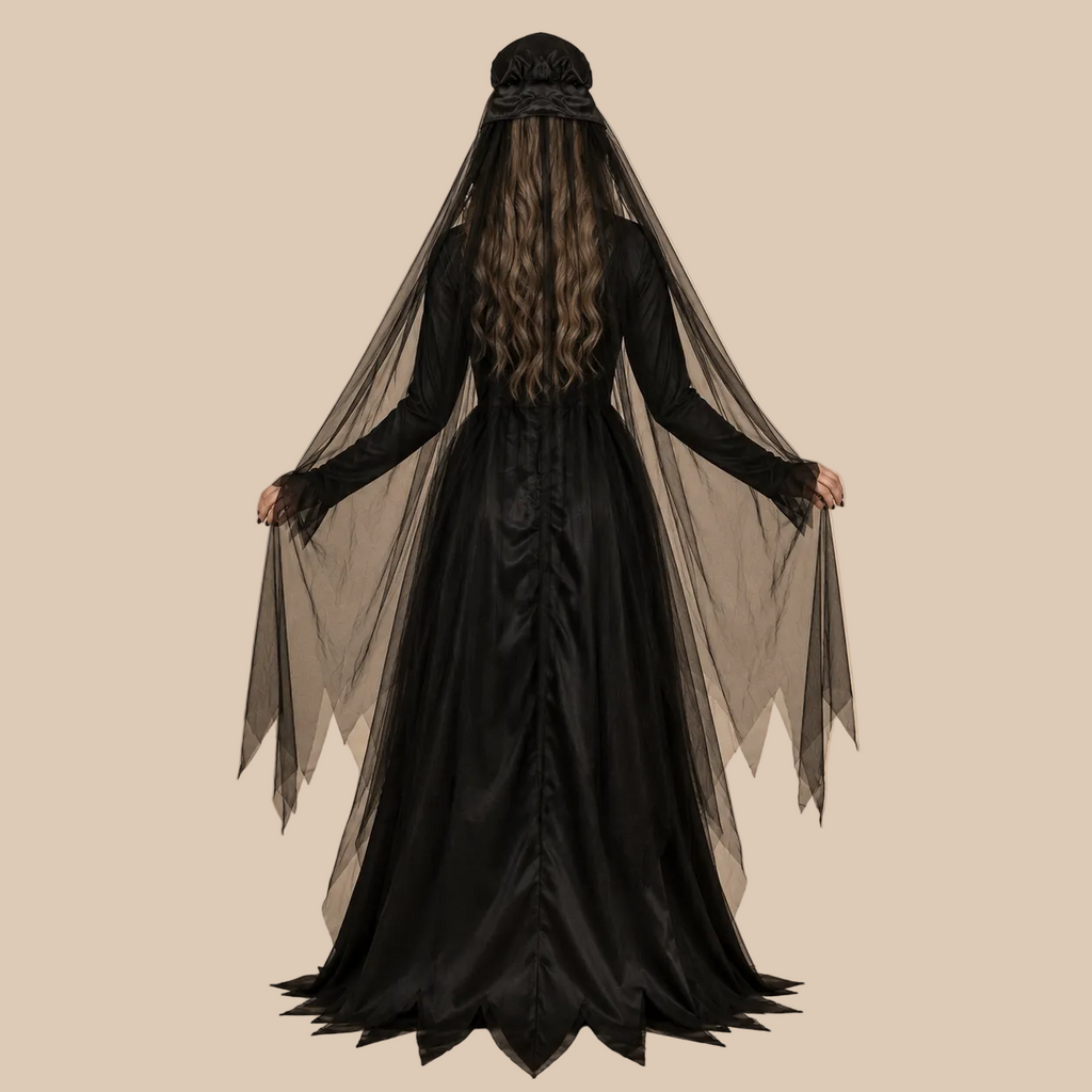 Long black gothic dress with a fitted waist, back view