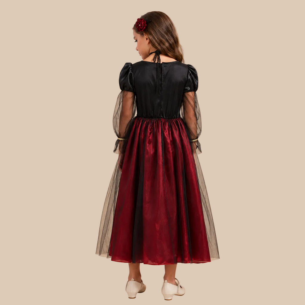 Girl’s dark red vampire dress with black sheer sleeves, back view