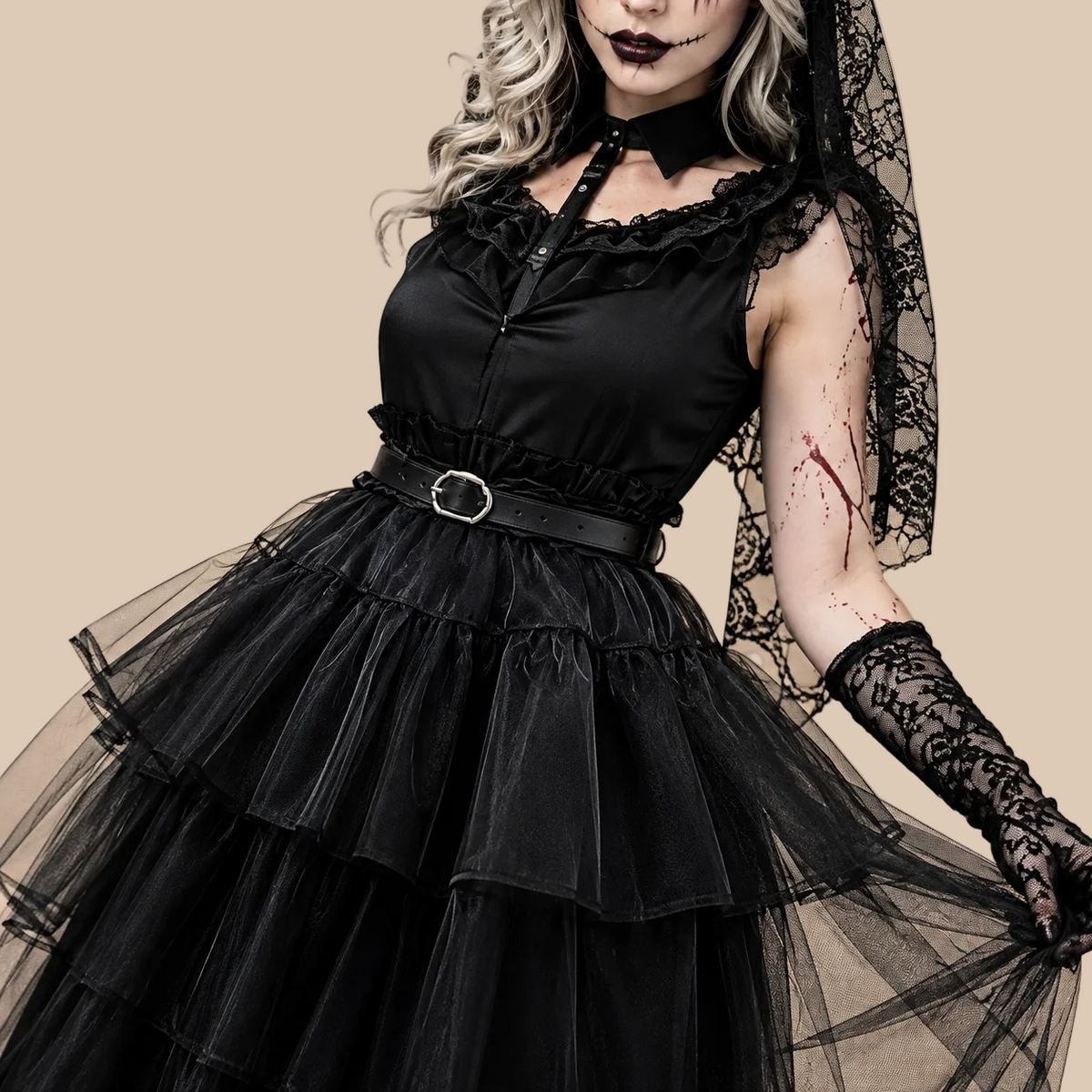 Women’s black gothic dress with tiered tulle skirt, skirt shown spread out