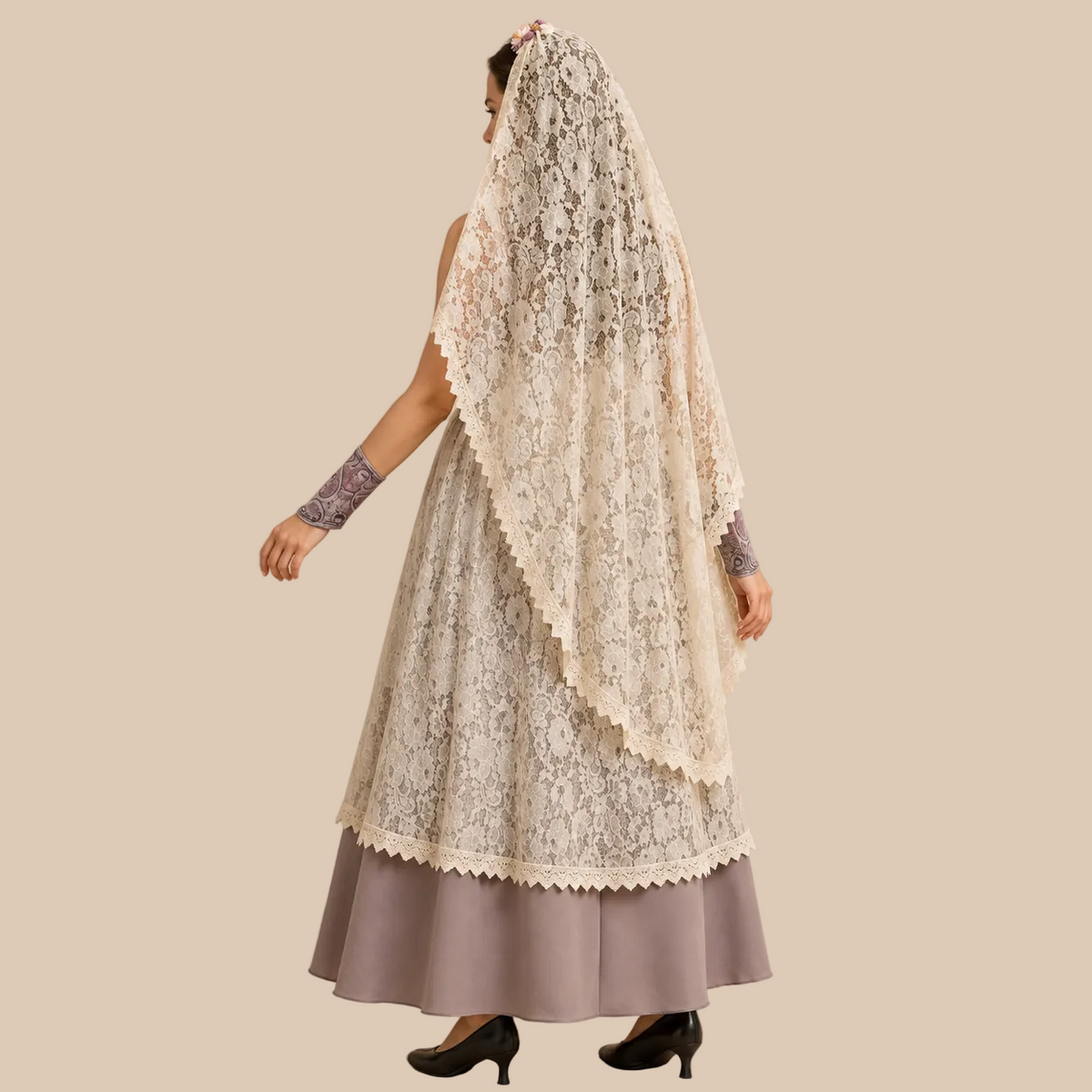 Beige layered bridal-style dress with lace overlay, back view