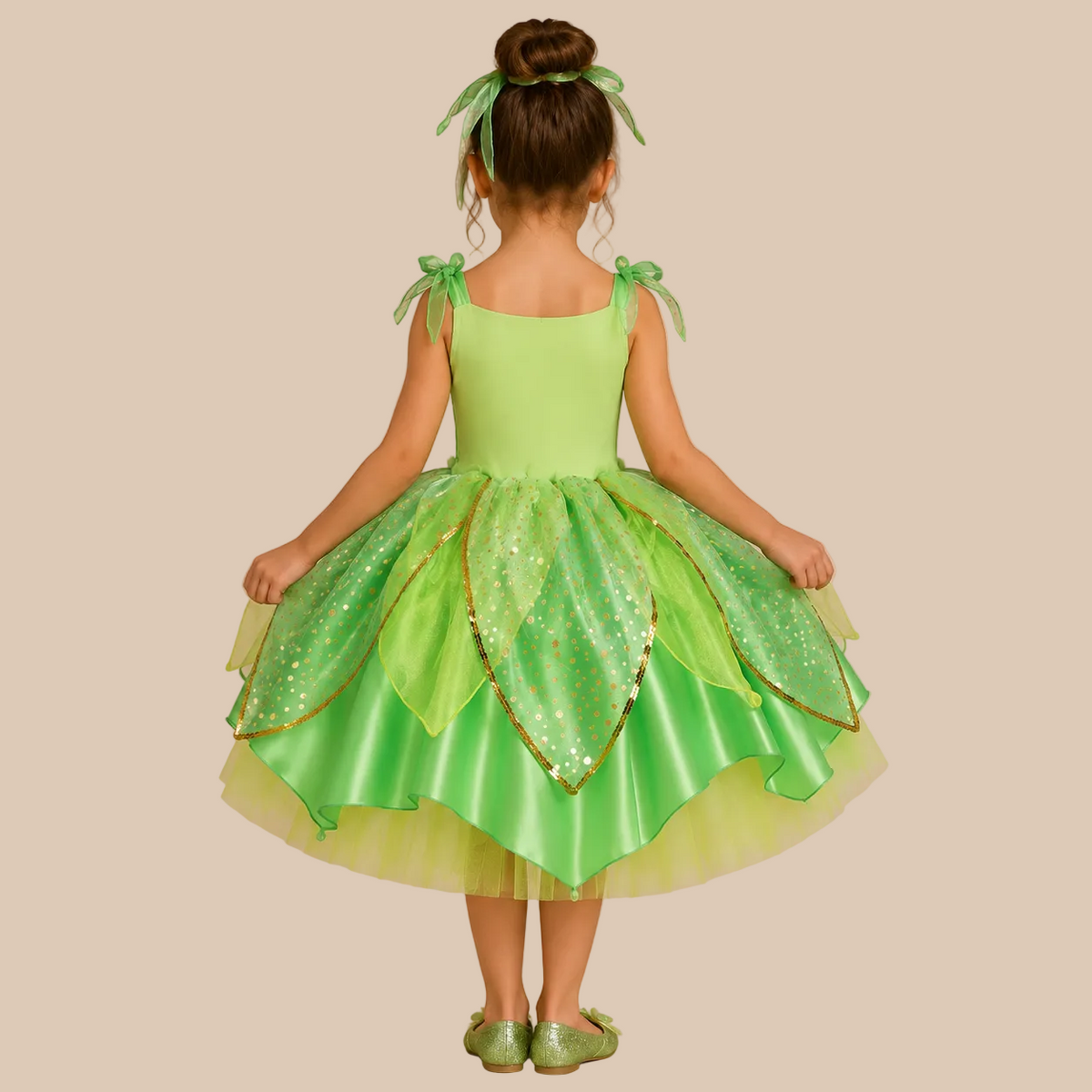 Girl’s green fairy dress with leaf-shaped skirt layers, back view