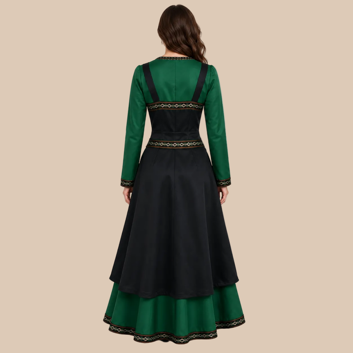 Women’s long green dress with black patterned panels, back view