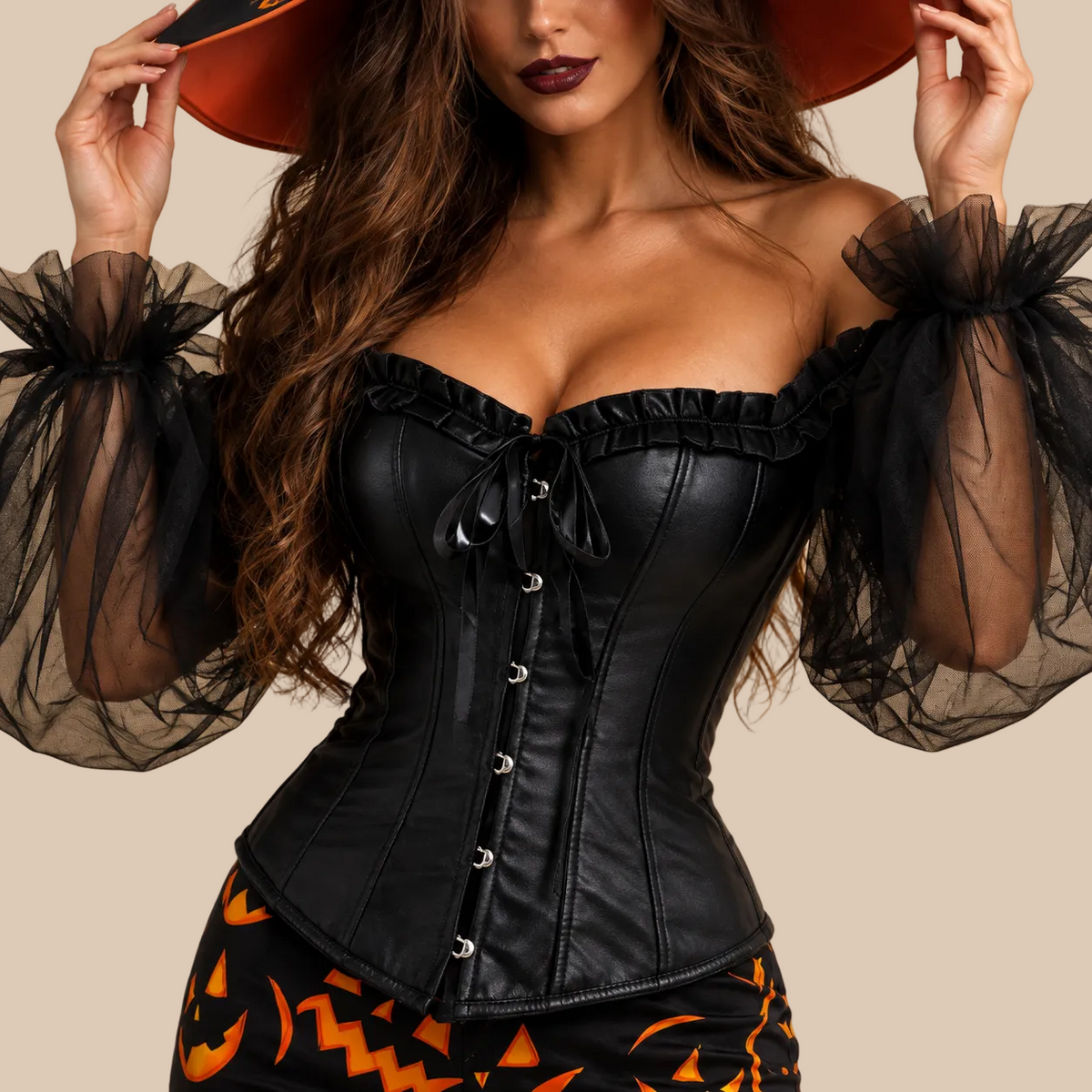 Women’s witch outfit with black bodice and pumpkin-print trousers, bodice details