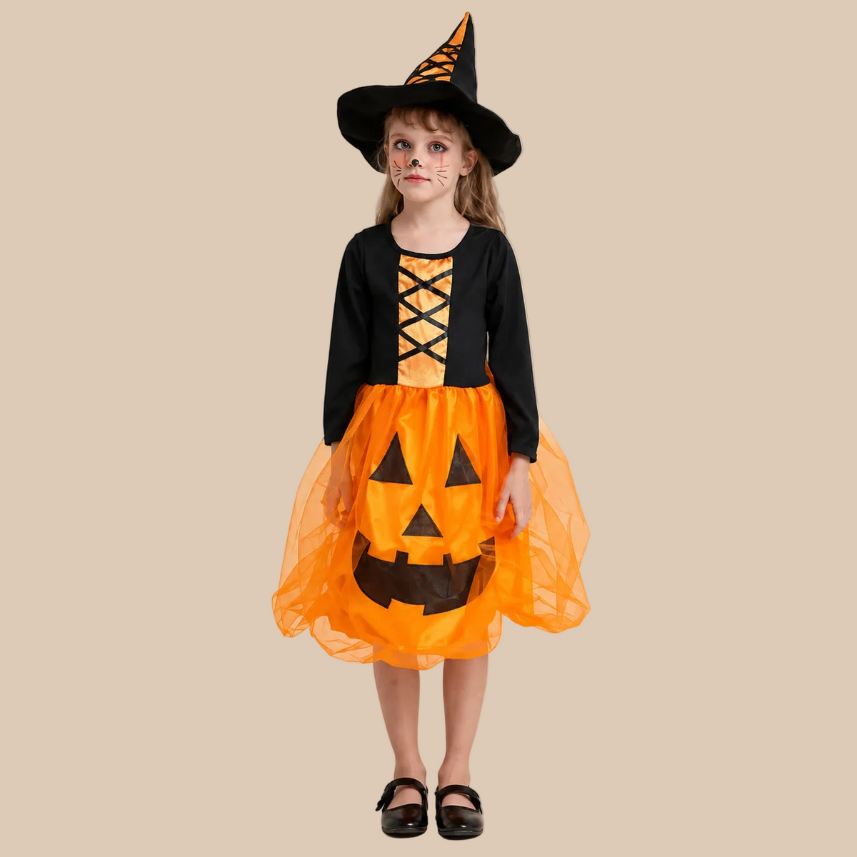Girl’s orange pumpkin dress with black top and front lacing, front view