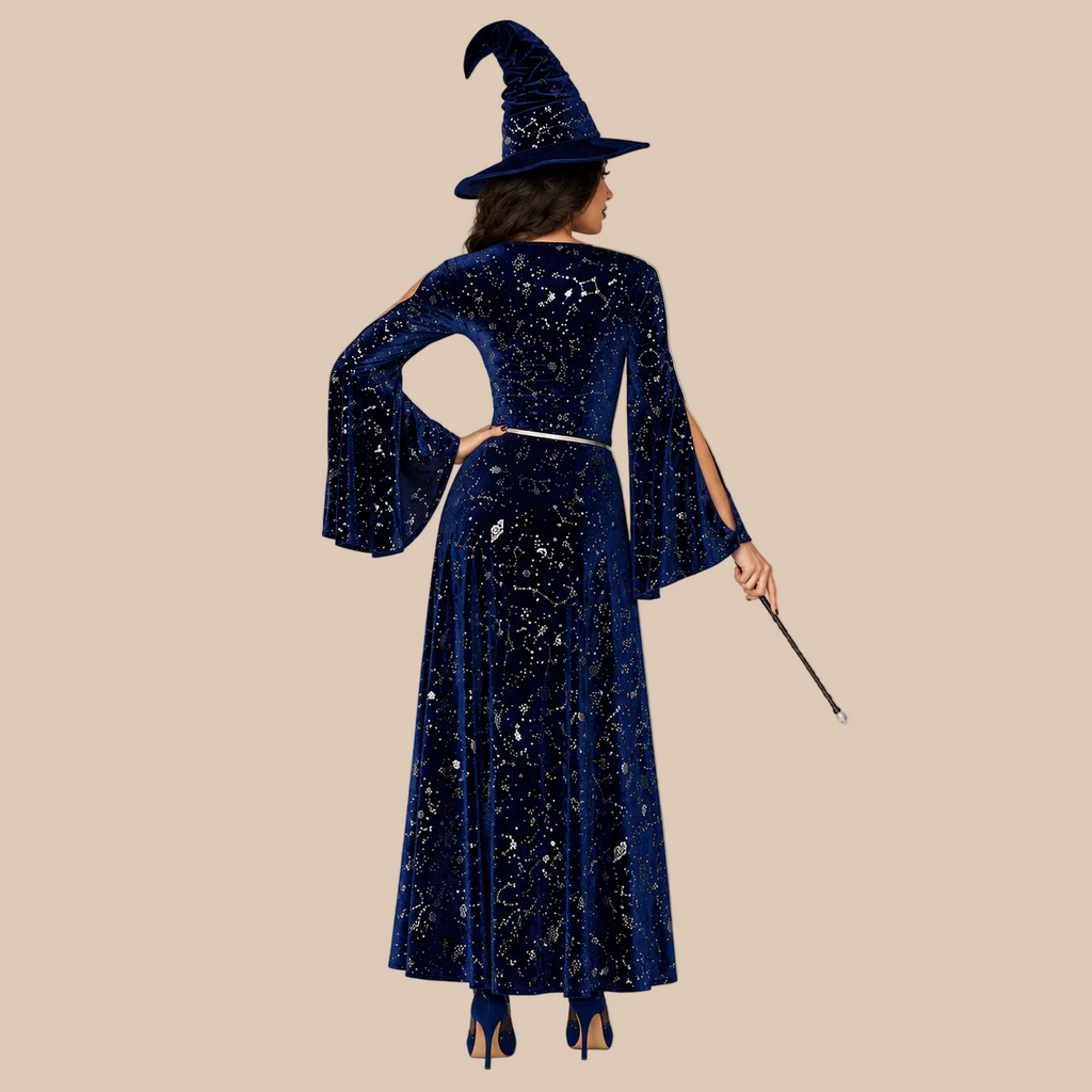 Women’s dark blue witch dress with starry print and flared sleeves, back view