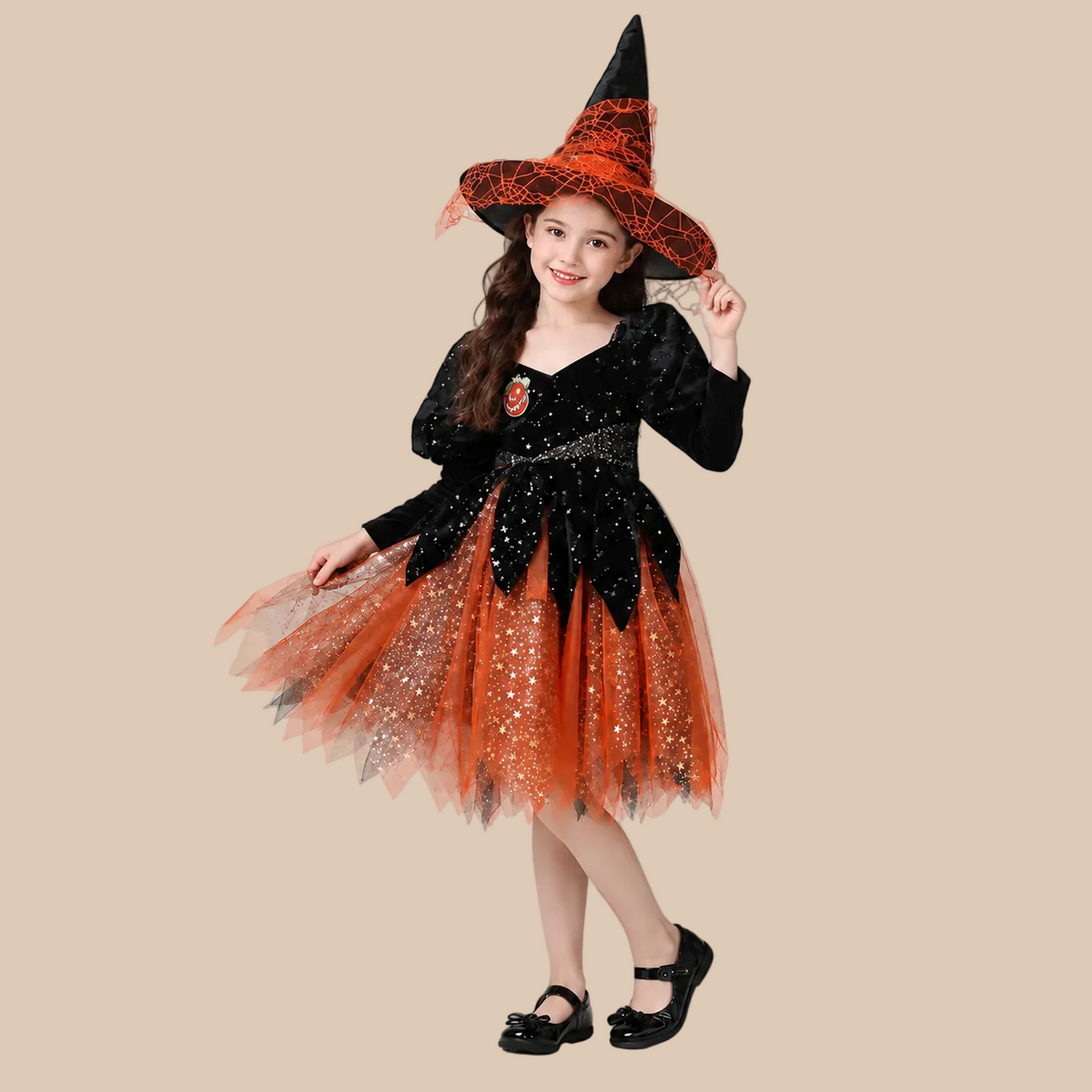 Girl’s orange and black witch dress with glittery tulle skirt, front view