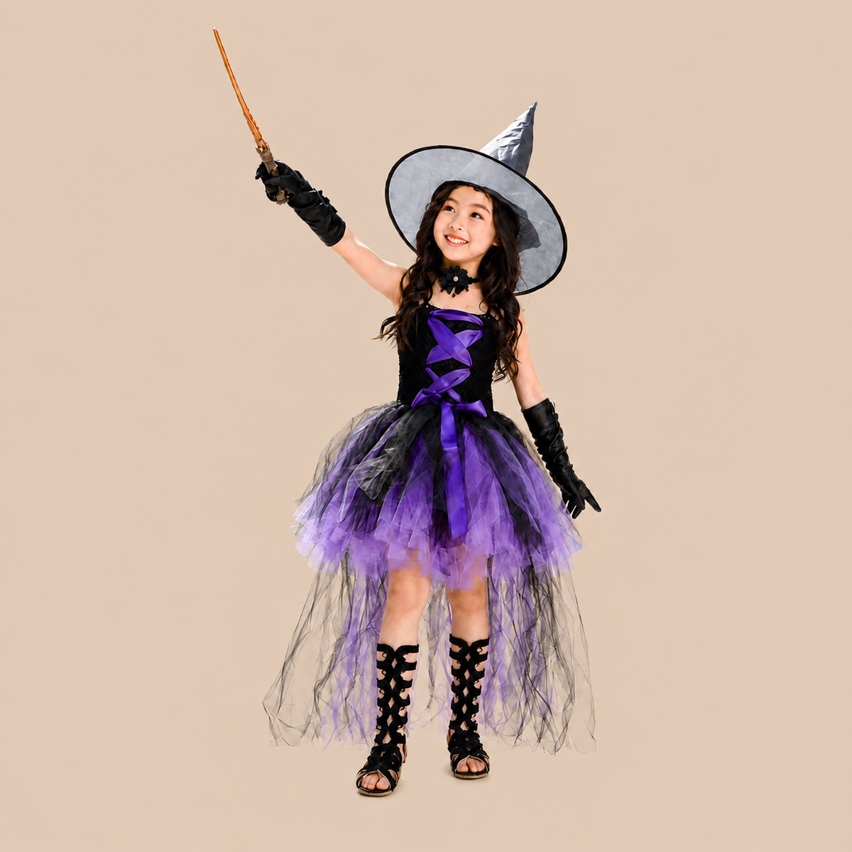 Girl’s purple witch dress with a long trailing skirt, alternate front view