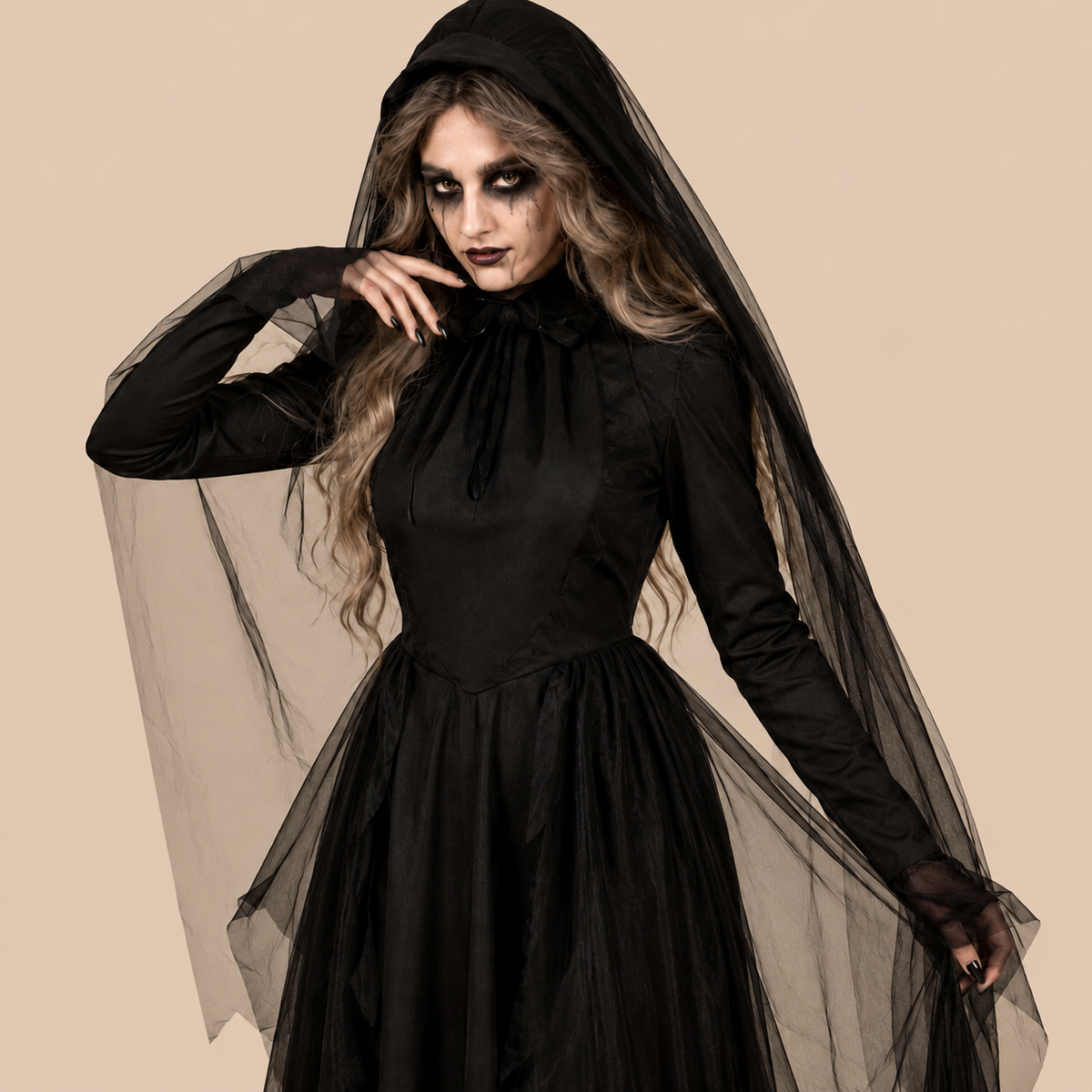Long black gothic dress with a fitted waist, bodice details
