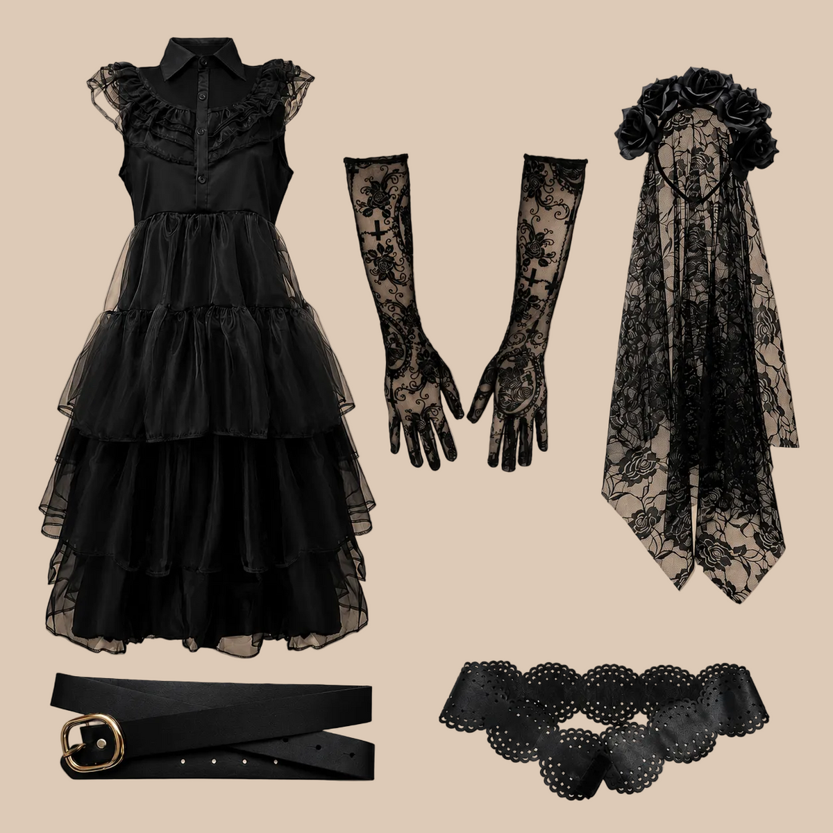 Black tiered costume dress and styling accessories, laid flat