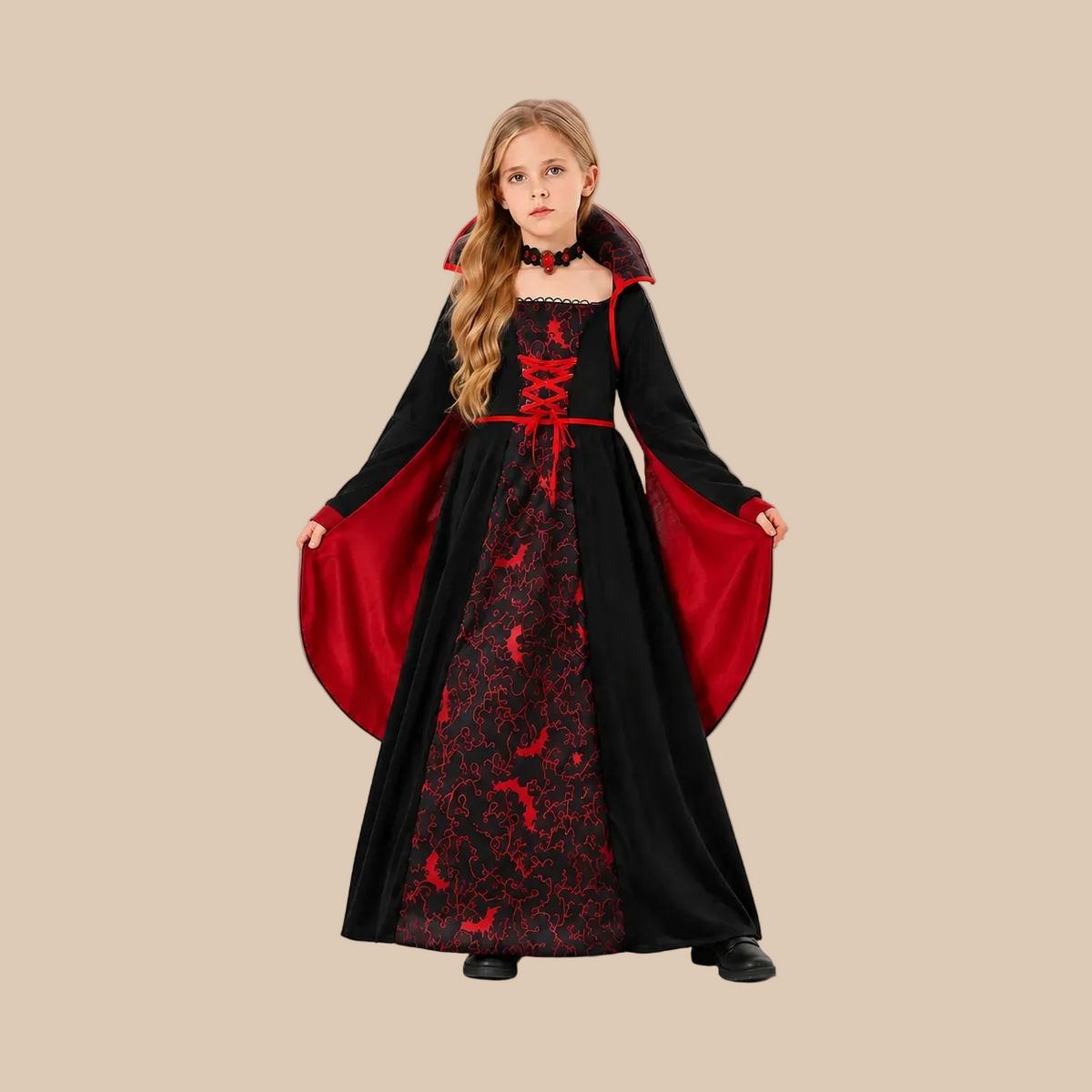 Girl’s long vampire dress with contrasting front panel, sleeves shown spread out