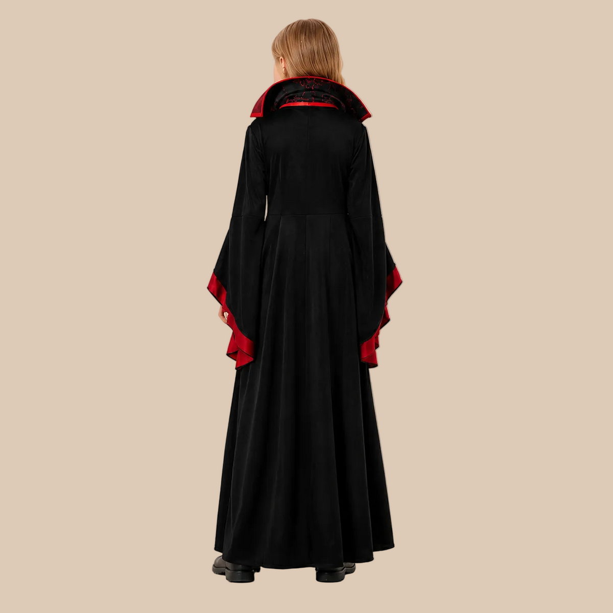 Girl’s long vampire dress with contrasting front panel, back view