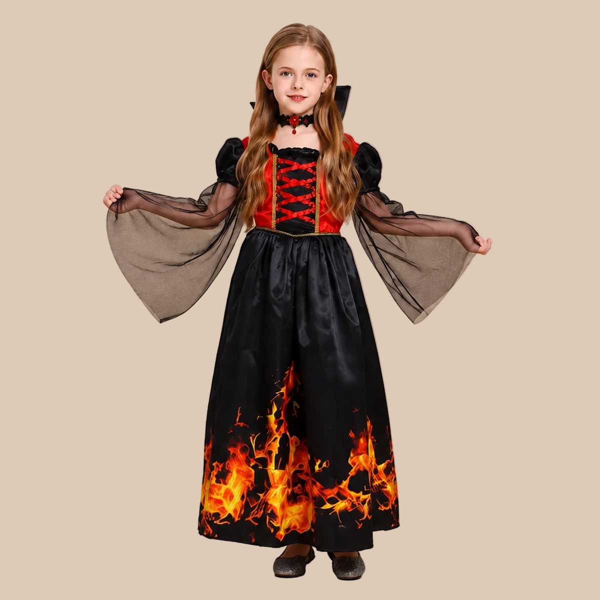 Girl’s vampire dress with flame-pattern hem, sleeves shown spread out