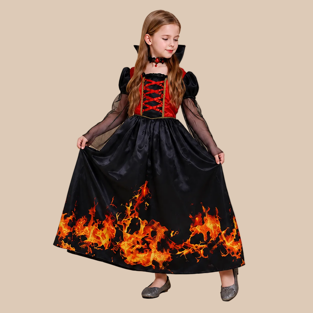 Girl’s vampire dress with flame-pattern hem, skirt shown spread out