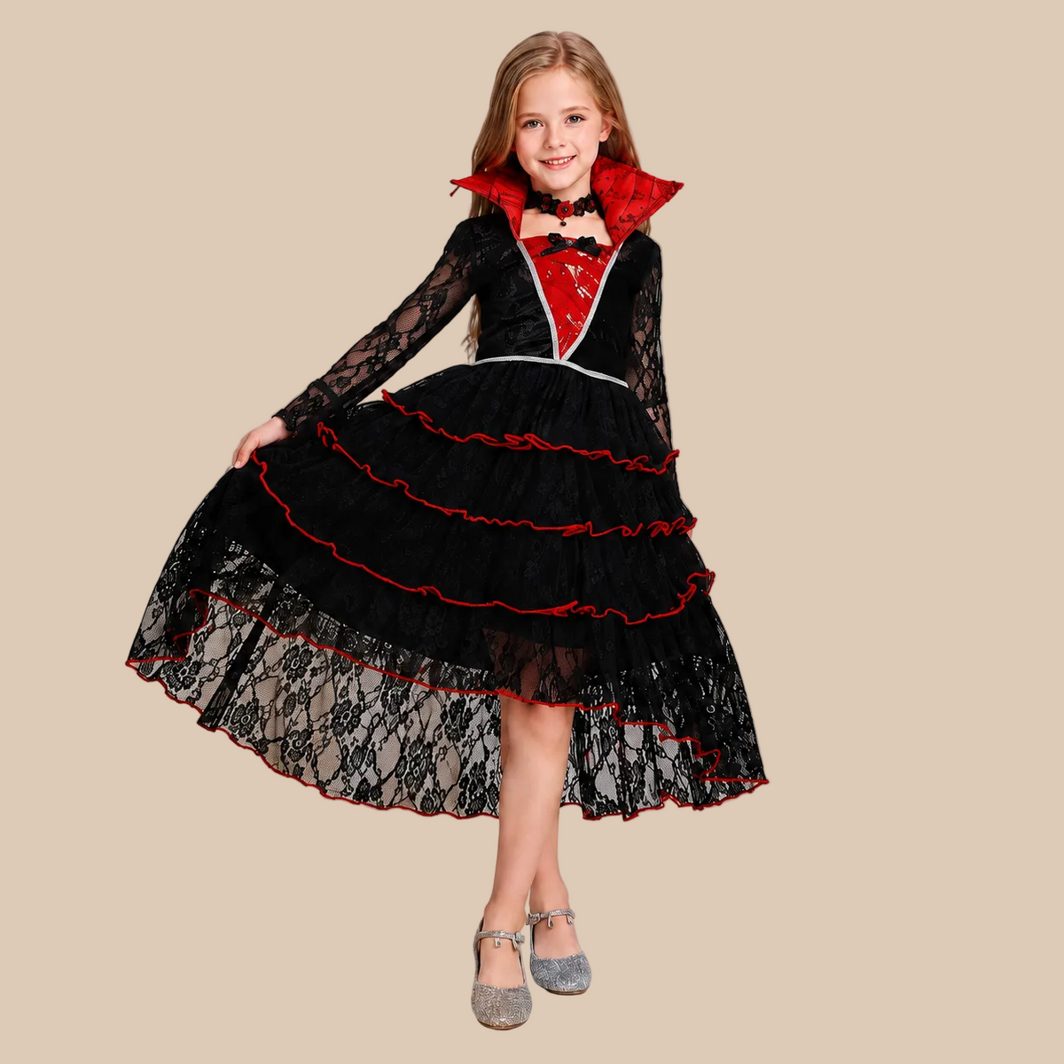 Girl’s tiered gothic dress with lace sleeves, skirt shown spread out