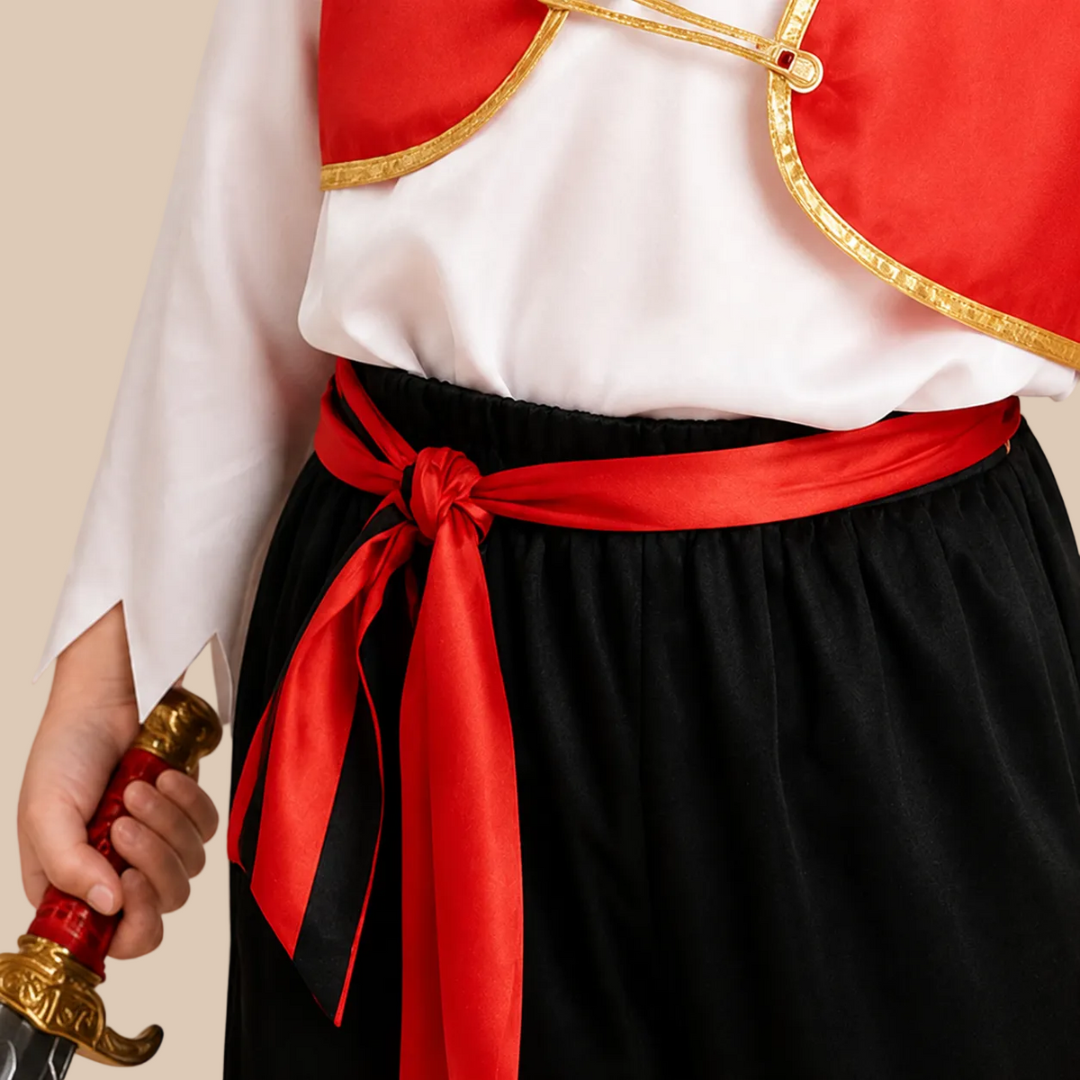 Child’s pirate outfit with red waistcoat and striped trousers, waist details