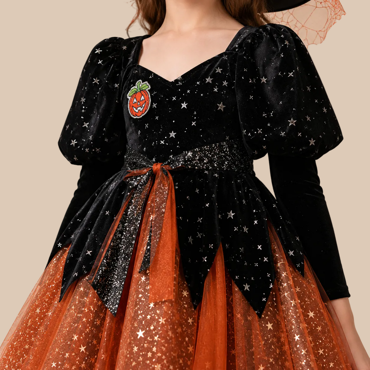 Girl’s orange and black witch dress with glittery tulle skirt, bodice details