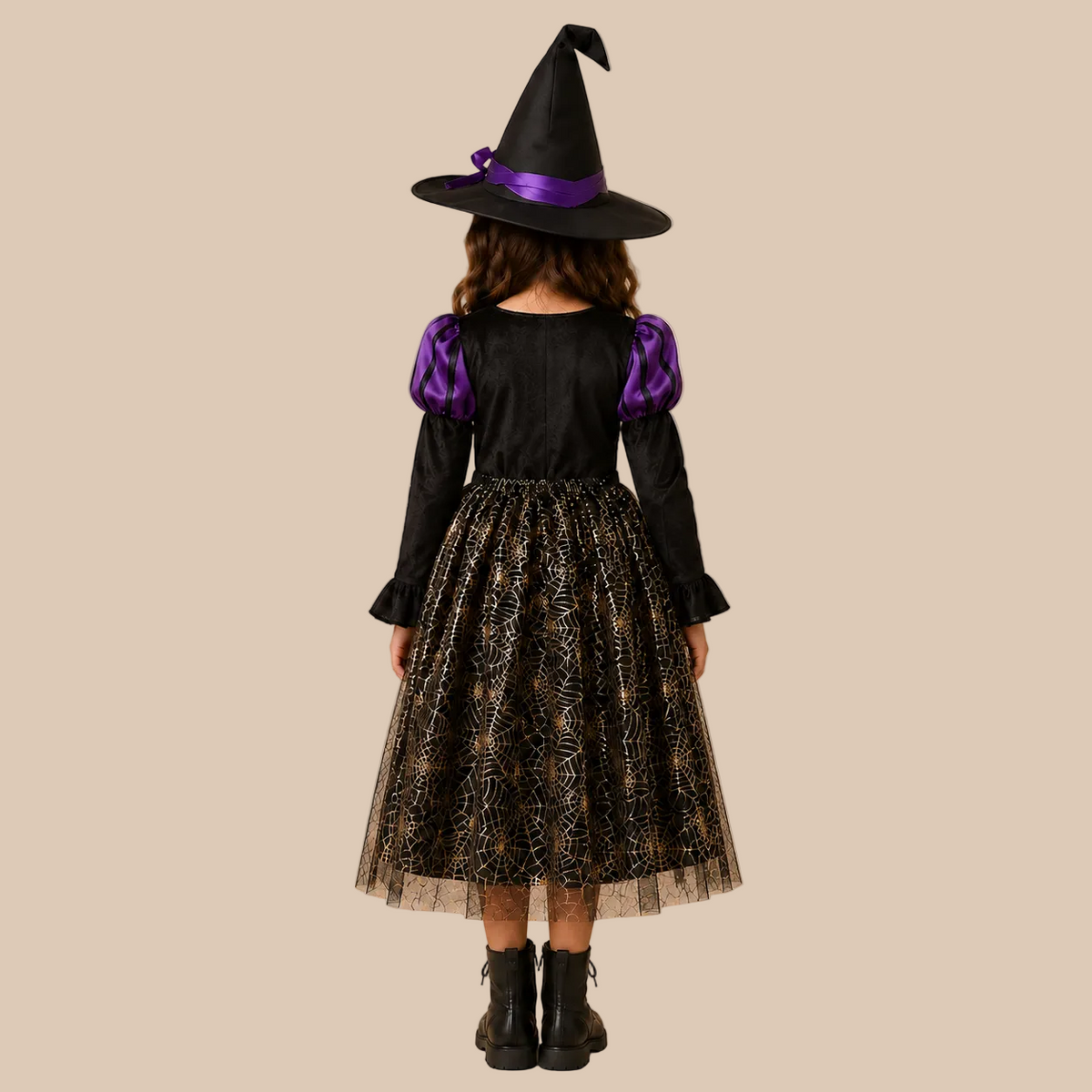 Girl’s purple witch dress with patterned sheer skirt panels, back view